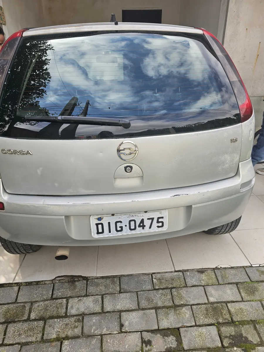LOTE 001 - GM/CORSA HATCH, PLACAS DIG-0475; FABRICAÇÃO/MODELO 2002/2003; RENAVAM 788428357; COR PRATA
