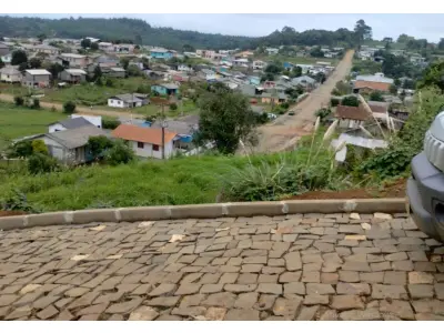 LOTE 001 - MEAÇÃO CORRESPONDENTE A MARIO VEZARO (ISTO É 50% DO TERRENO DE 900,00 M² NA ESQUINA DAS RUAS JOSÉ RAMOS COM JOÃO BARILKA, EM CALMON/SC