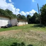 IMÓVEL 18.242,00M², SITUADO NA RUA ROBERTO FERREIRA DE  LIMA,  FUNDOS,  COMARCA DE RIO  NEGRINHO.